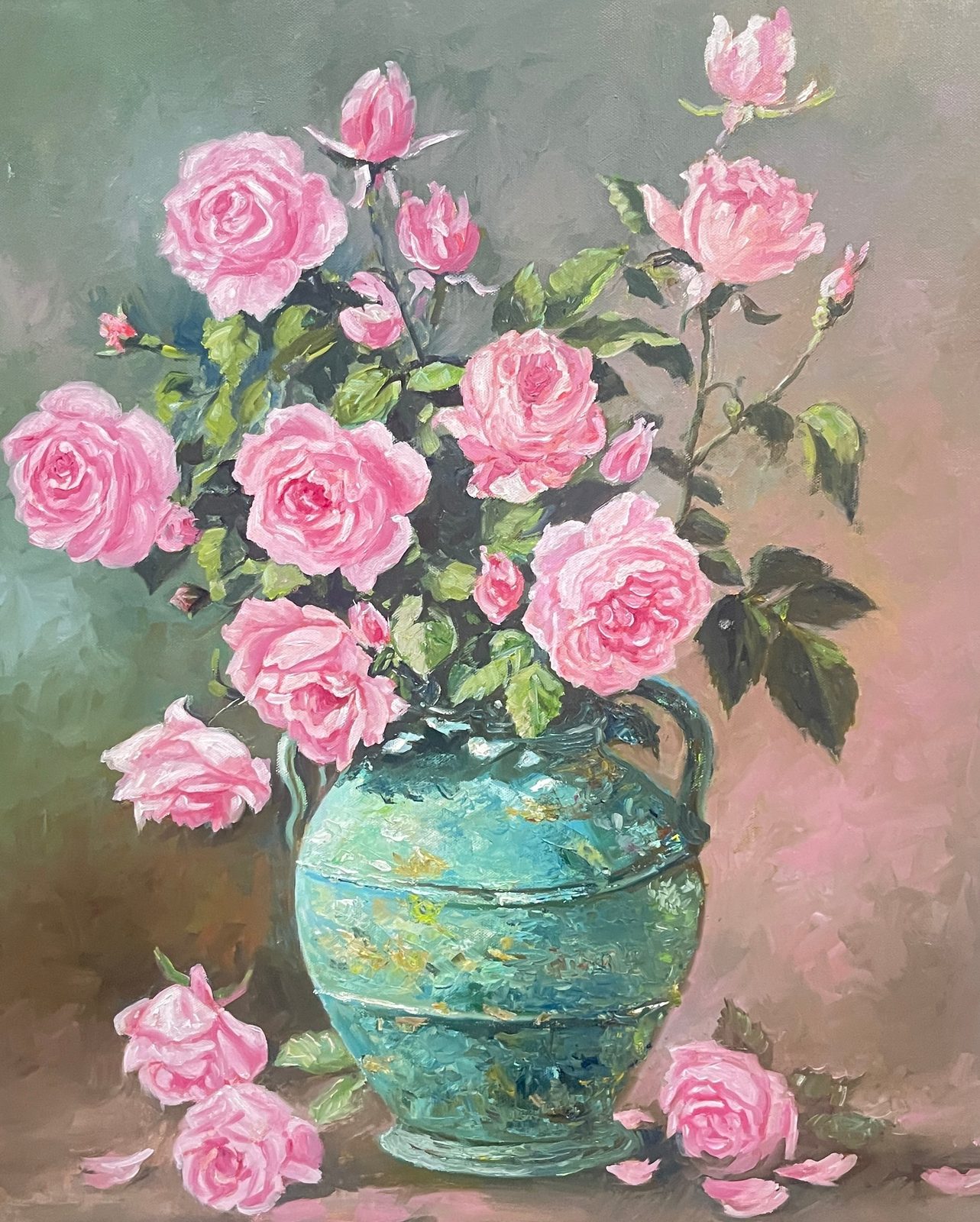 Bouquet of pink roses arranged in a turquoise vase