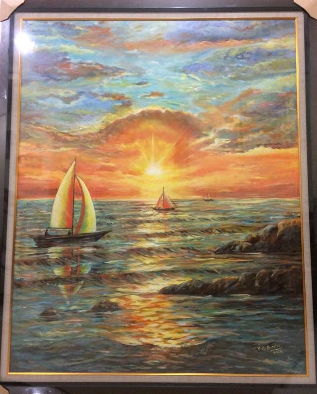 Sailboats on the sea at sunset